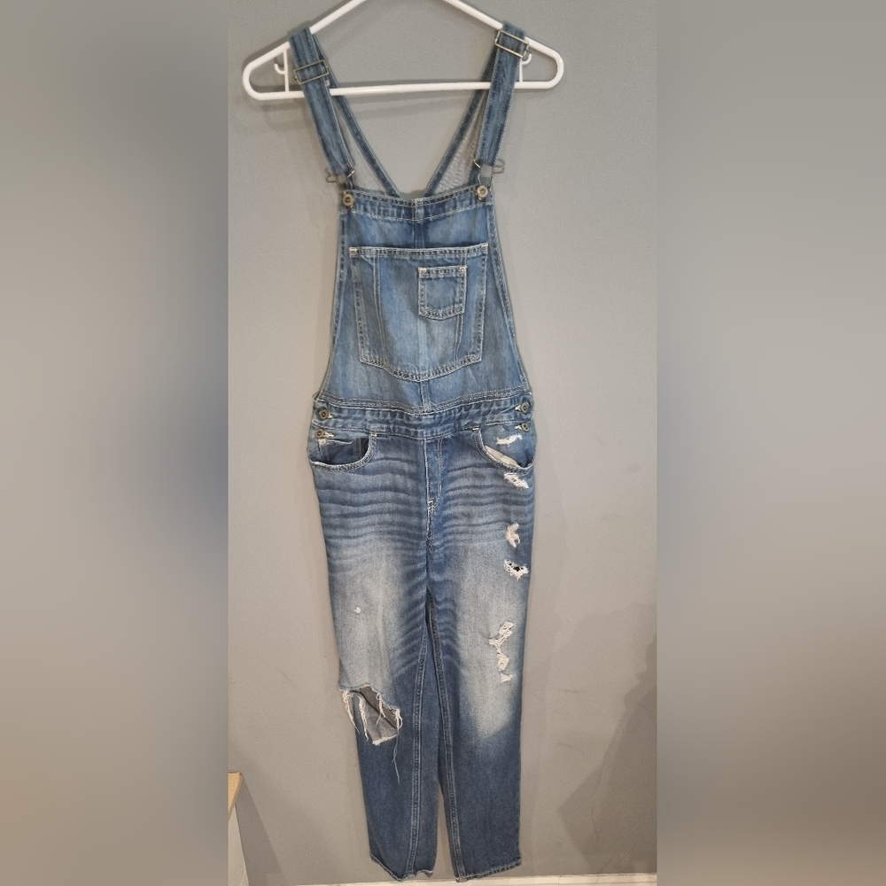 Hollister Women's Distressed denim overalls size medium